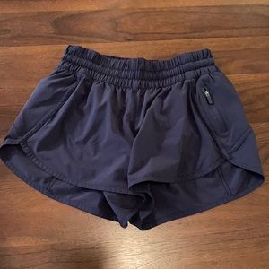 Lululemon tracker v shorts 4 inch in navy size 8